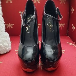 Black patent heel-less wedges